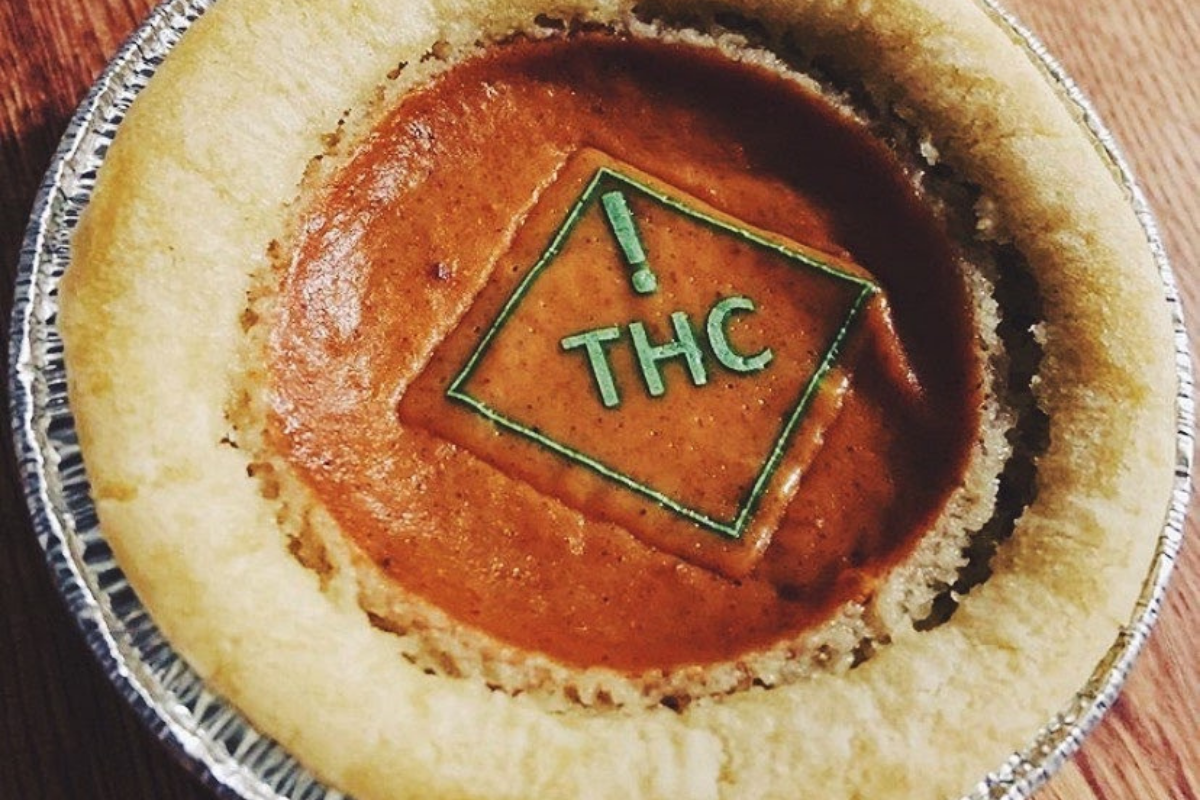 pumpkin pie with green thc symbol on top