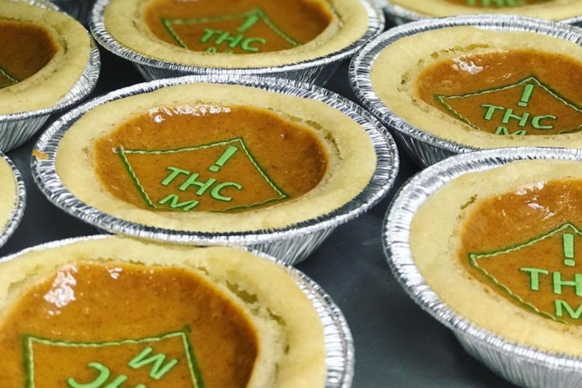 pumpkin pies with green thc symbol targets on top